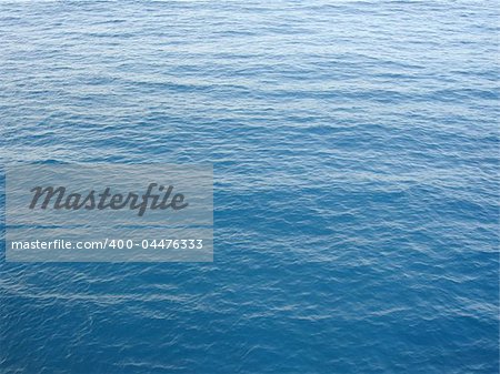 crystal clear blue sea waves texture from greece islands