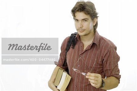 Portrait of male student holding book and wearing glasses