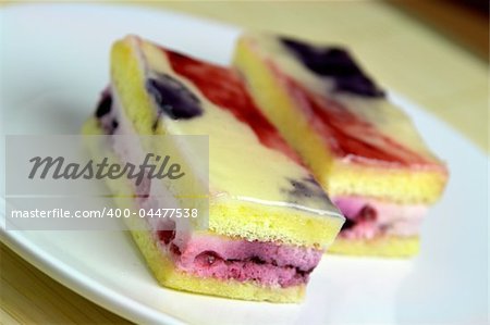Raspberry cake on white plate