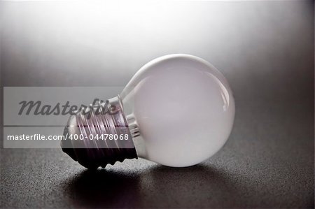 white off bulb on the dark background