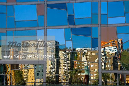 Quarter Deusto reflected in the palace euskalduna, Bilbao