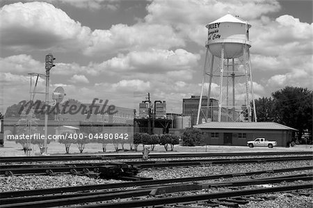 Railroad tracks near a peaceful town