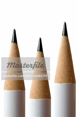 Closeup on three white pencils over white background - very high detail
