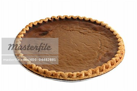 A whole pumpkin pie, isolated.
