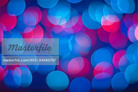 Vivid abstract background - defocused blue and red lights.