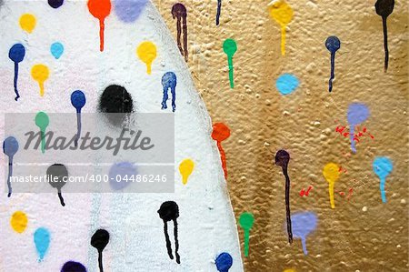 Detail of a wall covered with dots. Dripping paint. Graffiti urban street art.