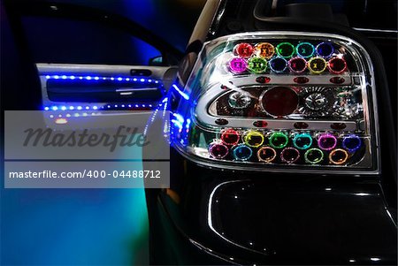 black tuning car with a lot of Light Bulb