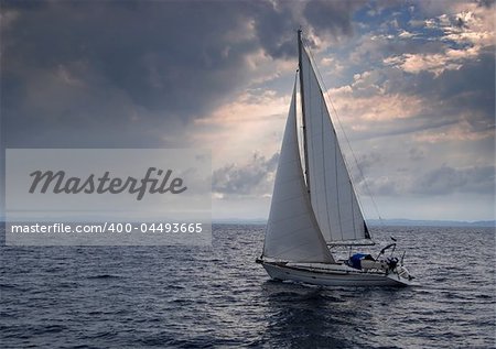 Sailing boat heading into a storm