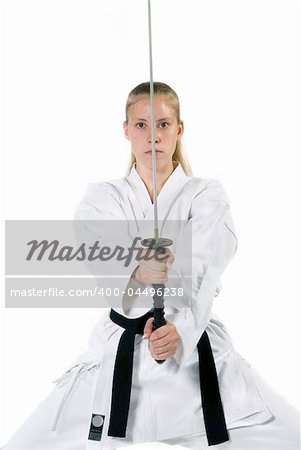 Female Third Degree Black Belt with Katana.