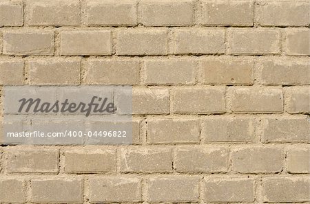 Fragment of new brick wall with stucco