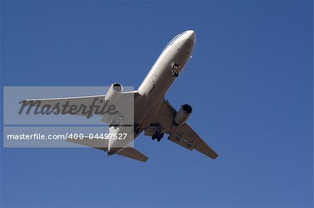 Landing passenger jet airplane