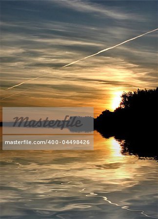 beautiful summer sunset reflected in a lake