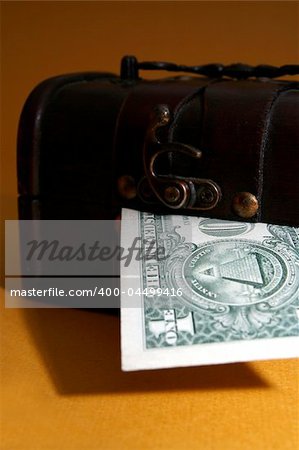 Wood cashbox isolated on brown