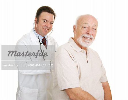 Doctor listening to a senior man's lungs.  Both smiling at camera.  Isolated.