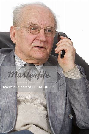 Expression of a senior man using a mobile phone.Shot with Canon 70-200mm f/2.8L IS USM