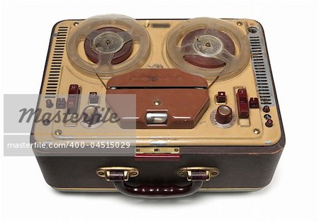 An old portable tape-recorder. Isolated.