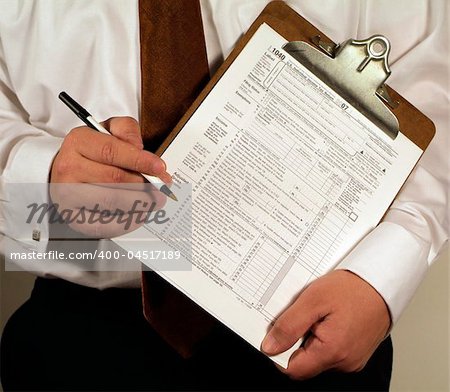 CPA Accountant holding a clipboard with a 1040 tax form ready to fill out.