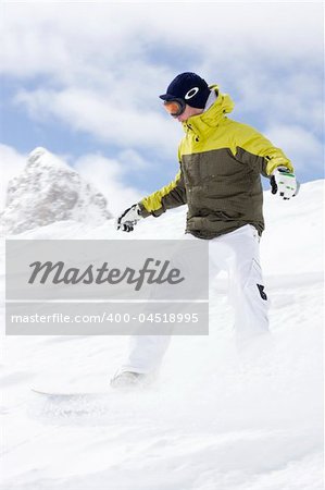 snowboarder boarding in fresh fallen snow