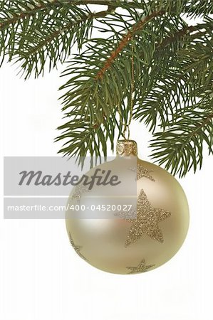 White christmas glitter ball hanging on a fir branch