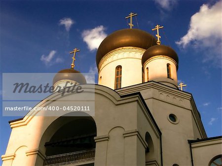 Evening Spring. Cupola churches and crosses against the backdrop of the sky.