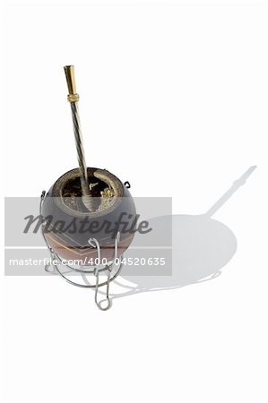 Isolated and close-up shot of an Argentinean Yerba Mate with gourd and bombilla
