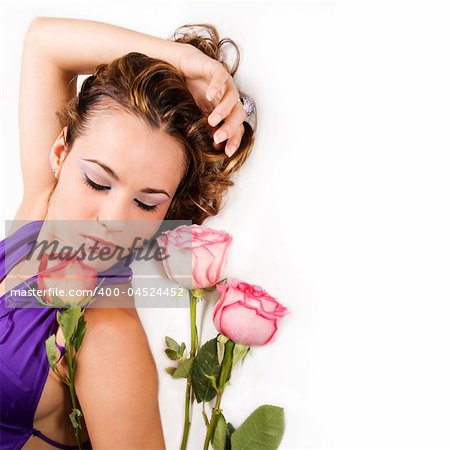 Portrait of isolated beauty with pink roses
