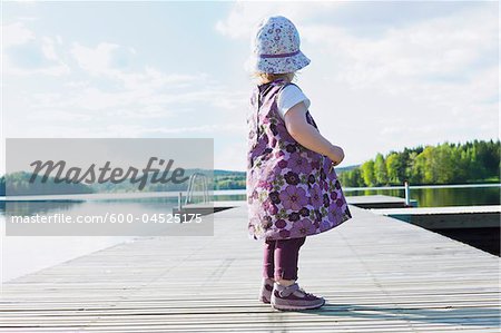 Girl Standing on Dock