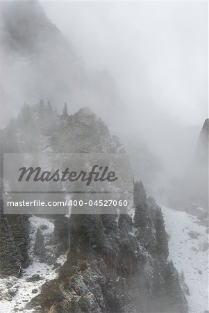 Rocks, forest and fog Kazakhstan, TyanShan mountains, Small Almaty gorge