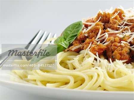 Spaghetti noodles with meat sauce.