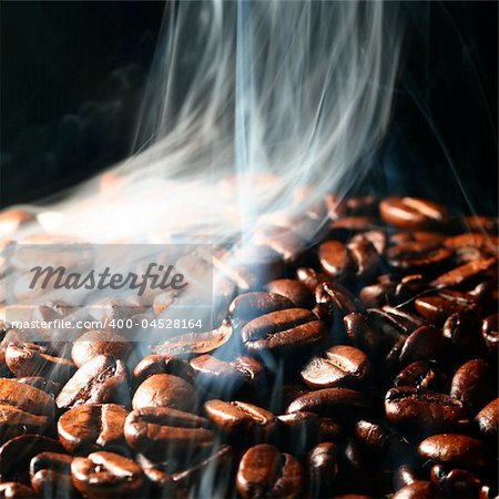 macro coffee beans in aroma smoke