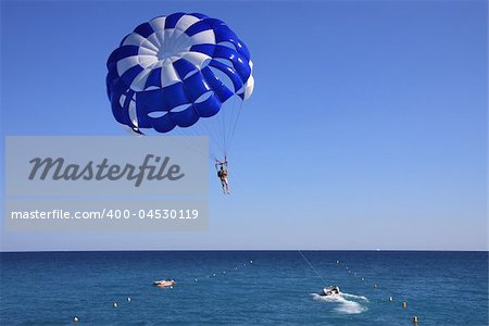 Sport activity - Parasailing over the Mediterranean sea