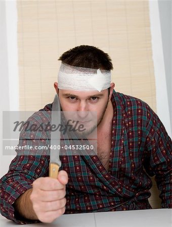 sick crazy man with kitchen knife