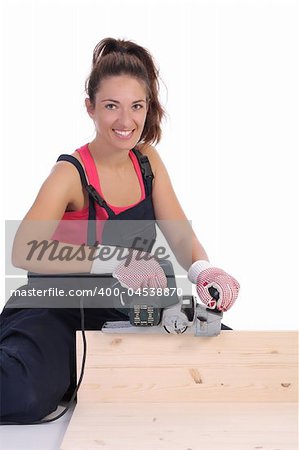 woman carpenter at work on white background