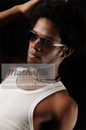 Portrait of young trendy latino fashion male isolated