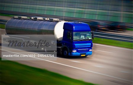 Tanker truck on motorway. Motion blur