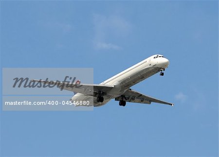 Passenger jet approaching airport for landing
