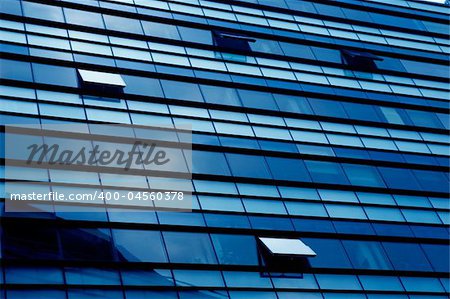 Windows of a modern building (blue tone)