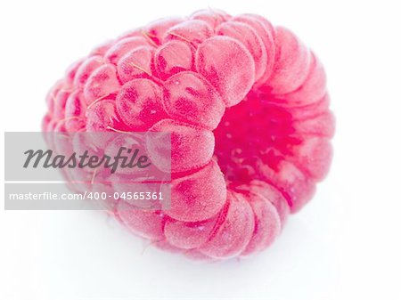 A fresh raspberry over white background