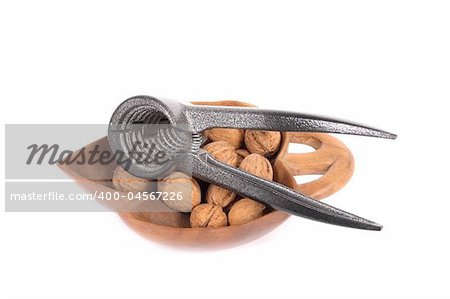 nutcracker and nuts on the white background
