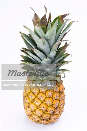 a ripe pineapple on white background