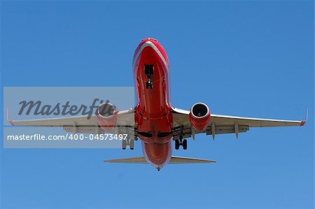 Red plane is going to land
