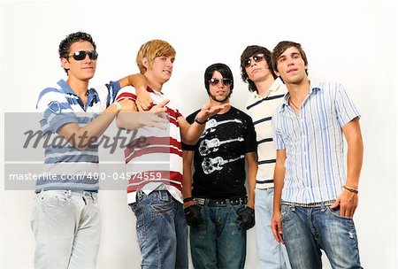 Portrait of young trendy teenager group standing isolated