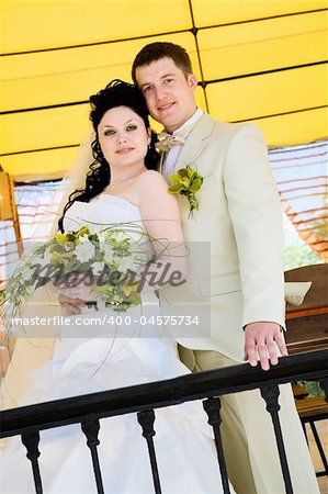 portrait of bride and groom on the balcony