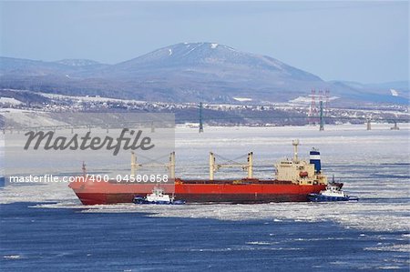 Cargo ship in St. Lawrence River docking in Quebec City