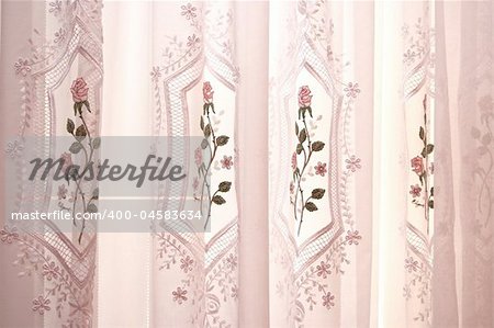 Picture of luxurious pink curtains.