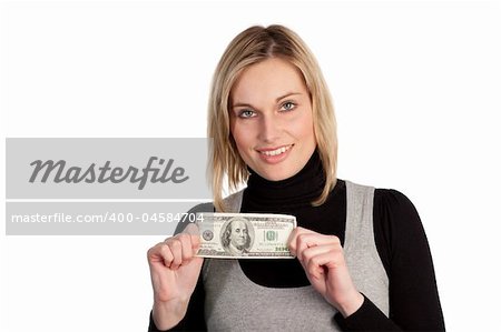 Attractive Buinesswoman holding up money and smiling