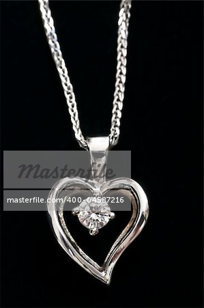 White gold heart pendant with diamond on a chain