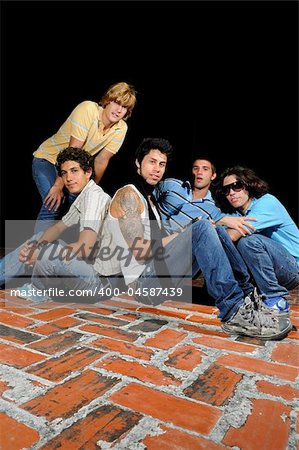 Portrait of young trendy team posing with attitude