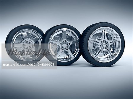 Car wheels with steel rims over the blue background