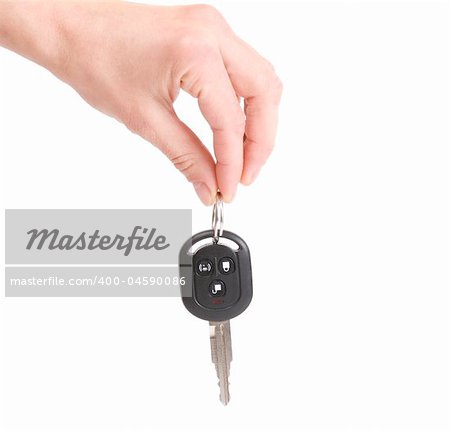 holding automobile keys isolated on white background